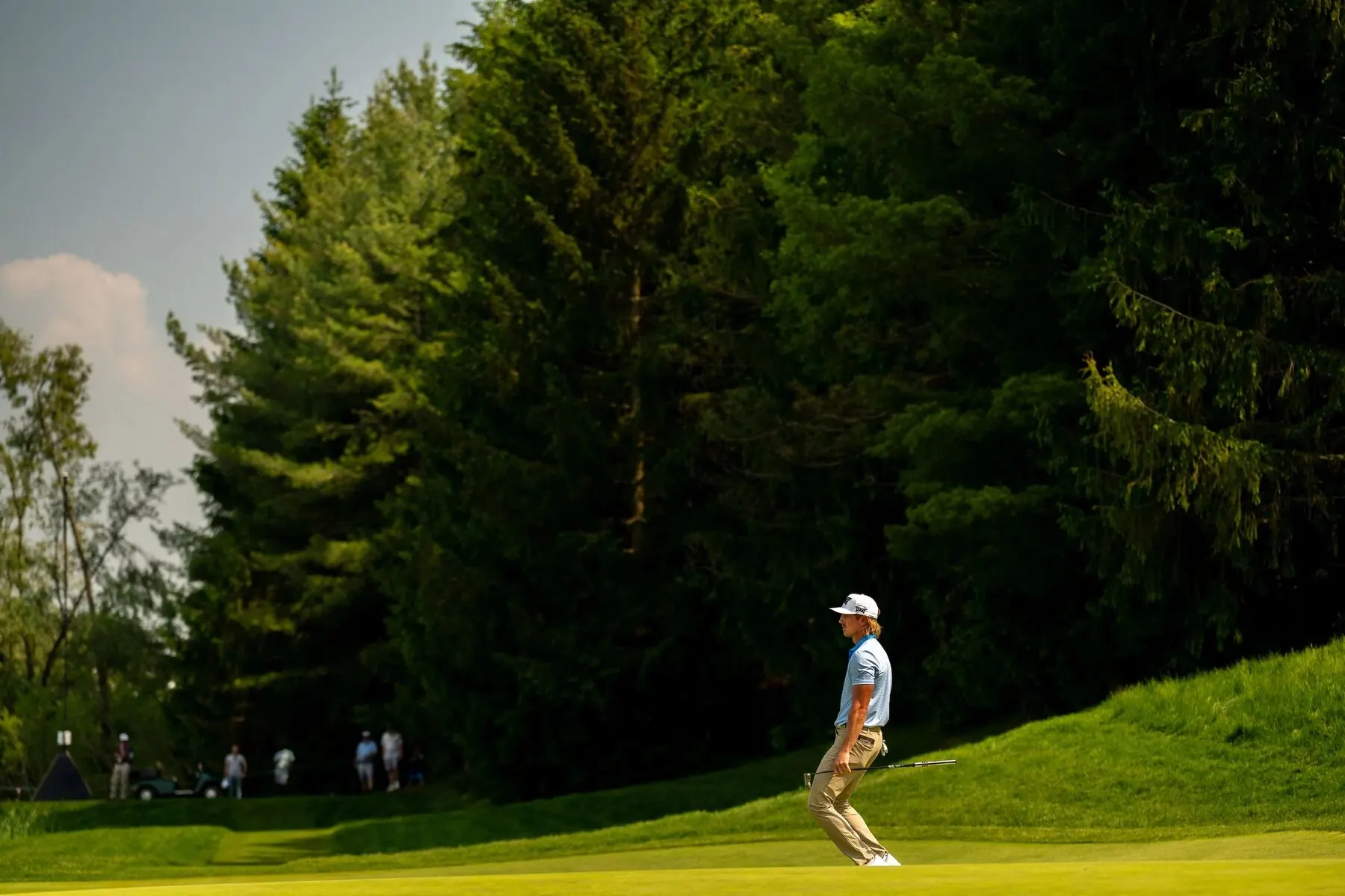Golfer and caddie at the RBC Canadian Open