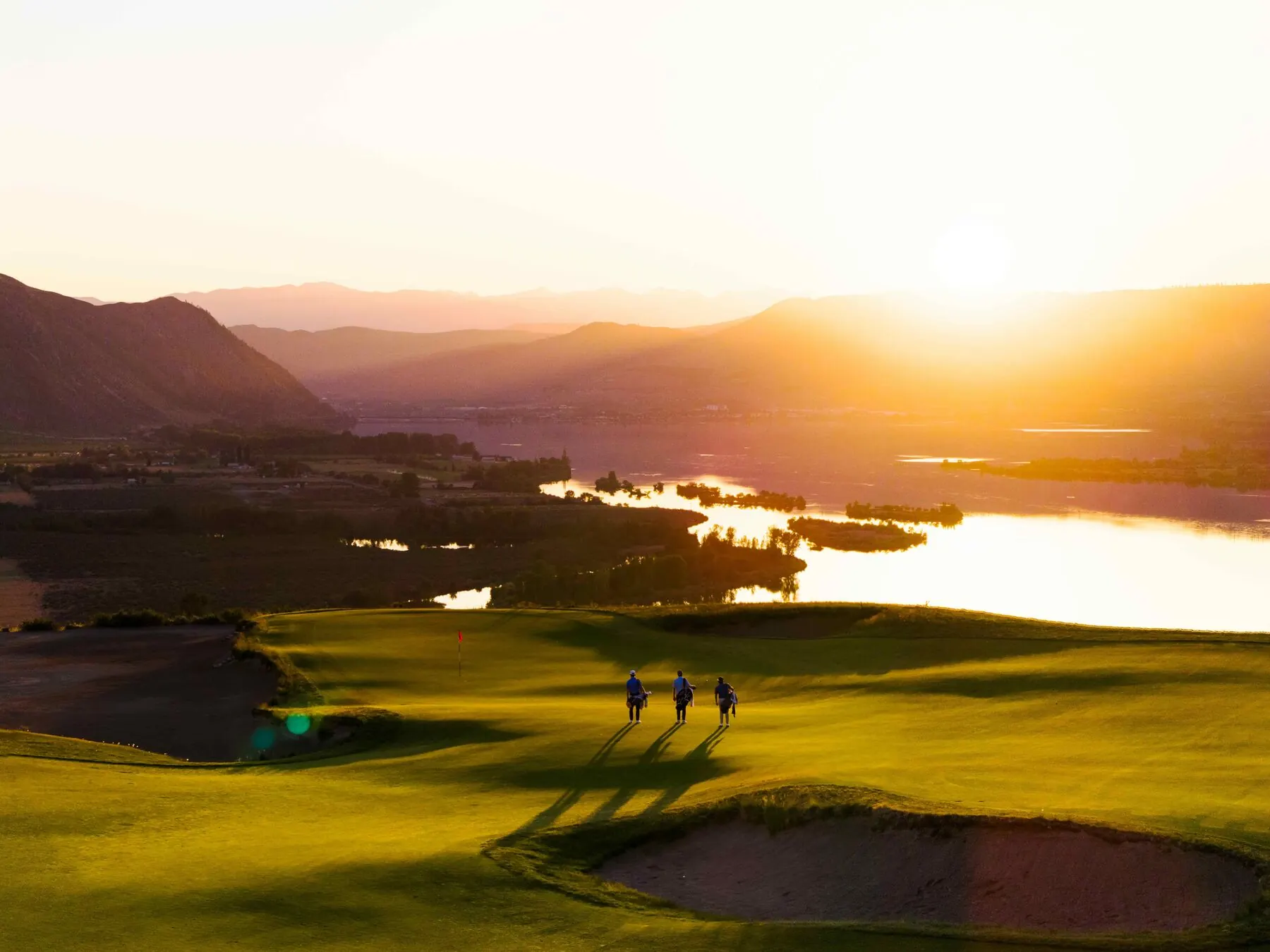 Green and bunkers at golden hour at Gamble Sands