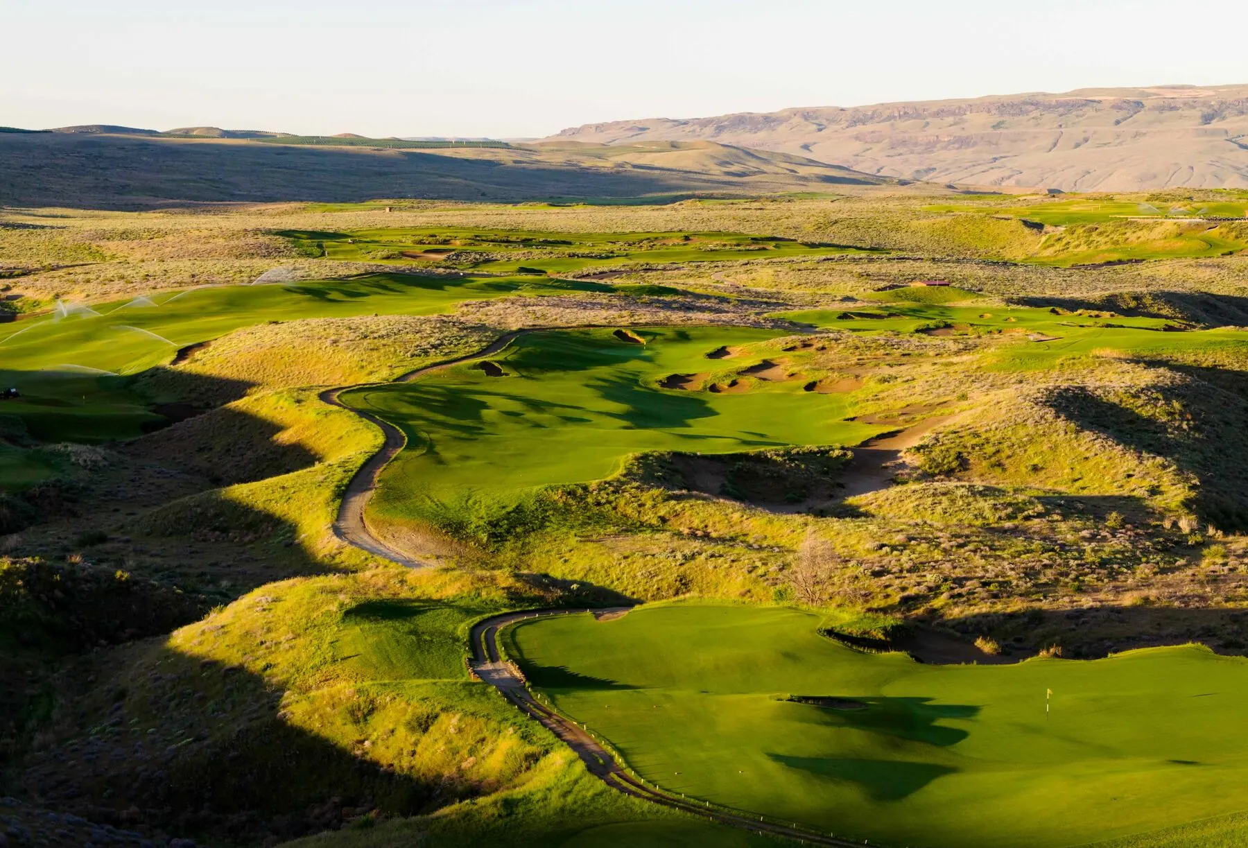 Green set against the desert hills