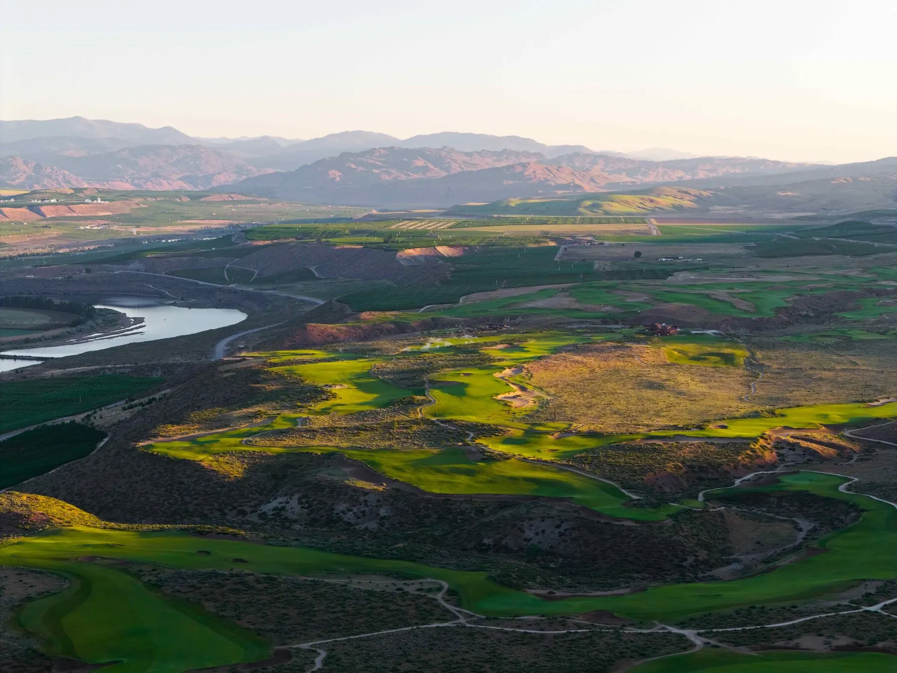 Fairway winding through desert terrain