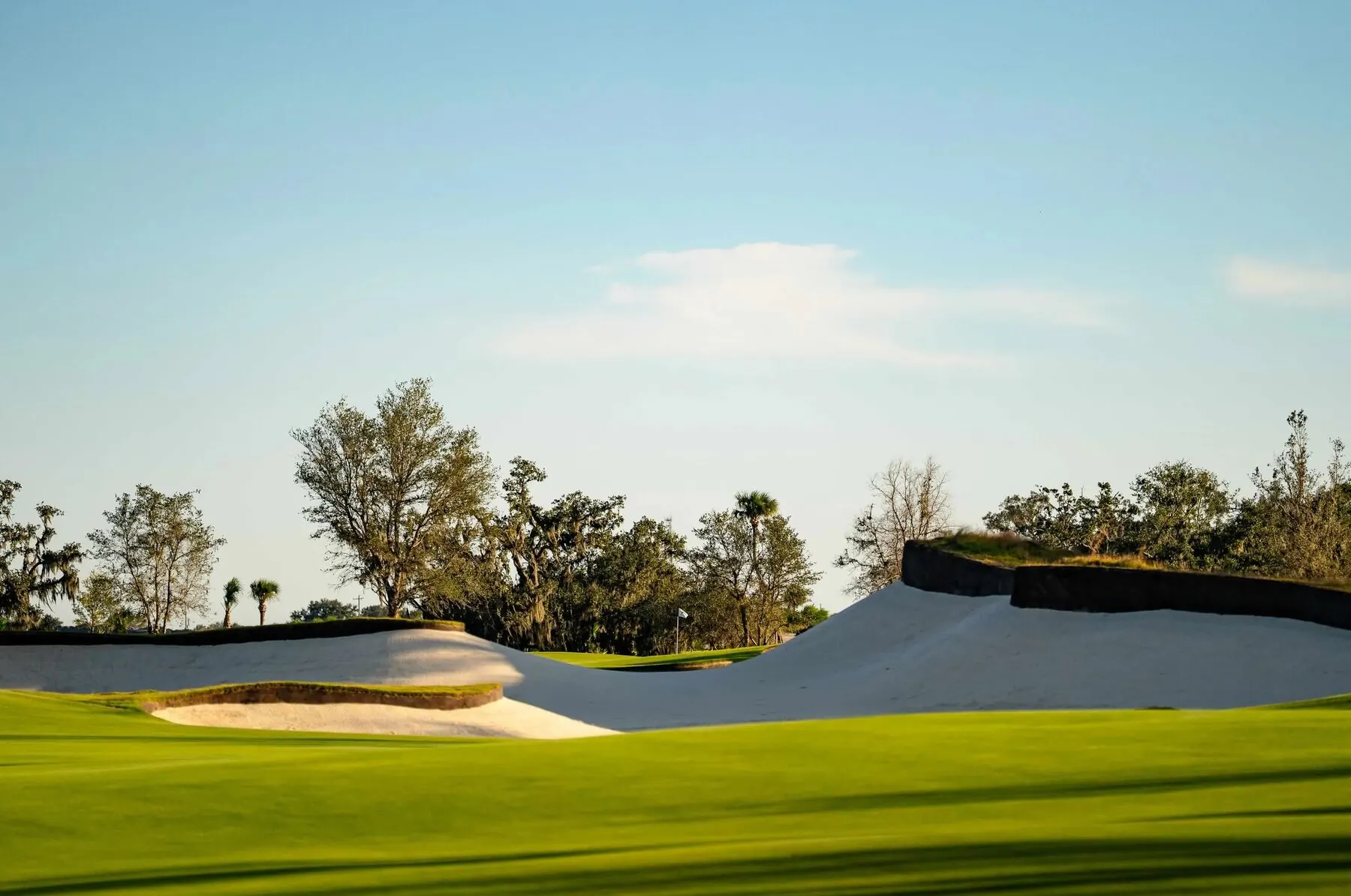 Bunker mounds against the sky at Miakka Golf Club