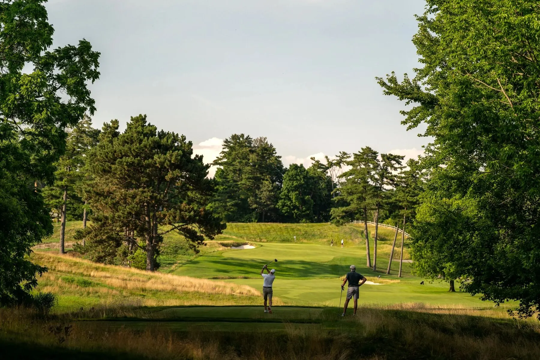 Caddie walking the course