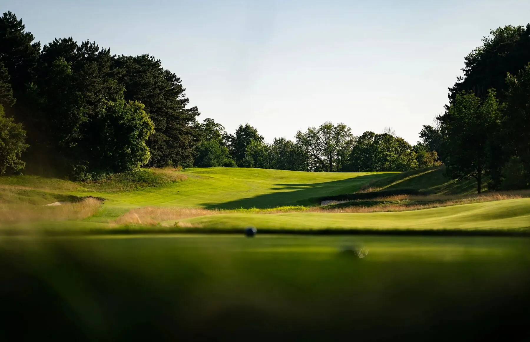 Golfer among bunkers at Toronto Golf Club